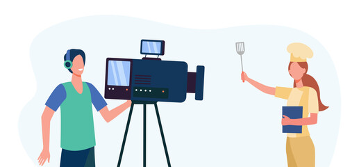 Cooking blogger taking video workshop