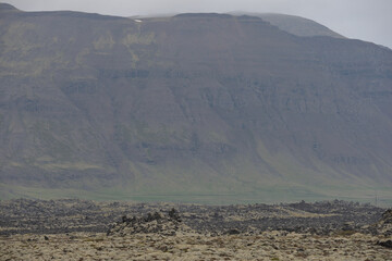 Wild mountain hiding in the clouds in Iceland