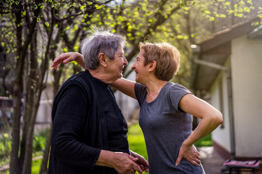 Very Old Woman Bonding With Her Daughter