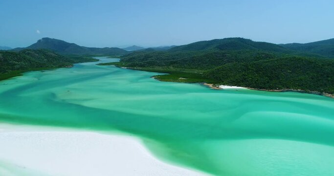 4K aerial forward tracking motion of Hill Inlet at low tide at Whitehaven beach,Whitsunday Islands,Queensland,Australia