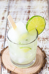 Brazilian lemon drink with distilled alcohol. Ice cream with drink called 