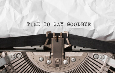 Text Time to Say Goodbye typed on retro typewriter