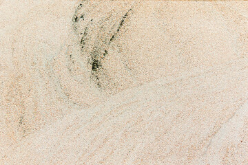 Apply sand rubbing plaster to masonry on concrete. Scratched and cracked dirty weathered sand textured plaster surface texture.