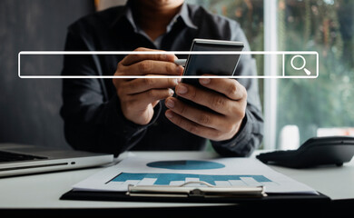 Searching Browsing Internet Data Information with blank search bar.businessman working with smart phone, tablet and laptop computer on desk in office. Networking Concept