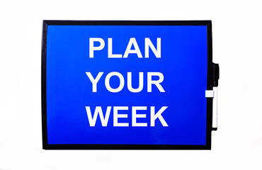 On a blue background a white inscription PLAN YOUR WEEK