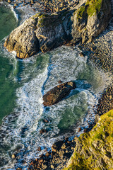 Waves flowing around rocks in north Norway