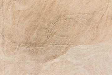 Apply sand rubbing plaster to masonry on concrete. Clean sand textured plaster surface texture.