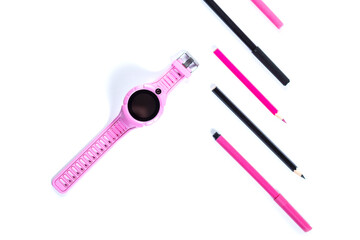 Children's smart watch. Pink gps watch. Pink watch with pencils isolatedf on a white.