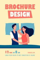 Happy couple lying in bed together and smiling