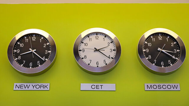 World Time Cet Three Clocks at Wall