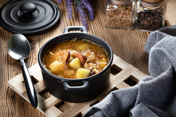 Traditional russian sour cabbage soup