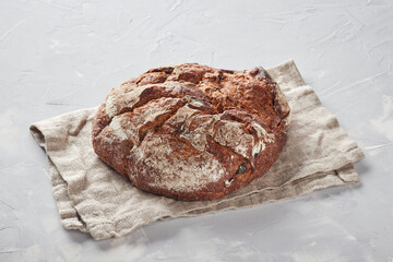 Rye flour bread, concrete background