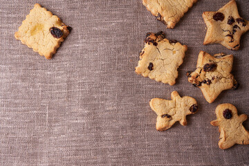 Chocolate cookies on linen napkin with copy space