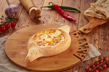 Khachapuri with cheese and egg, Georgian traditional cuisine