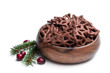 Chocolate pretzel shapes in wooden bowl isolated on white