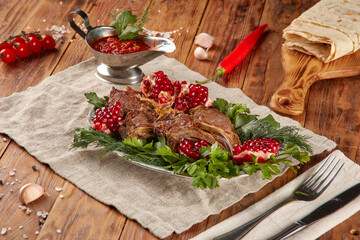 Grilled lamb rack BBQ, wood background
