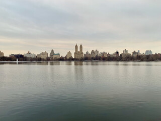 Fototapeta na wymiar The Eldorado skyscraper from Central Park's reservoir in a winter morning in midtown Manhattan New York City