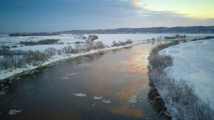 Beautiful winter landscape, sunset over the Dnipro river, view from the drone