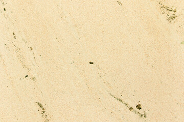 Apply sand rubbing plaster to masonry on concrete. Clean sand textured plaster surface texture.