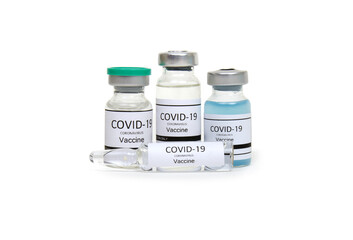 COVID-19 vaccine ampoule isolated on a white