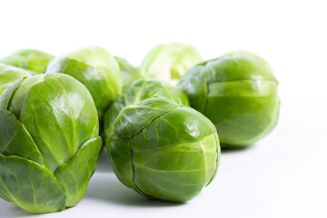 A pile of brussels sprouts, healhty cooking ingredient on white background