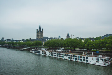 Fototapeta premium Rhine river in Cologne, Germany. Idyllic scenery in the city centre of Cologne.