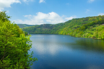 Rursee at Eifel National Park, Germany. Scenic view of lake Rursee and surrounded green hills in North Rhine-Westphalia