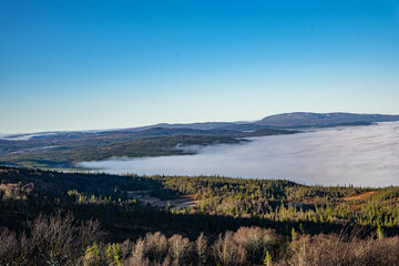 Fog over a valley of Lierne national park in Norway