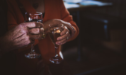 glass of wine in hand