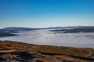 Fog over a valley of Lierne national park in Norway