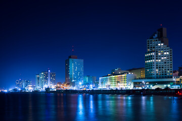 Fototapeta na wymiar Tel Aviv City At Night, Tel Aviv City At Night, City Lights Reflected On Water