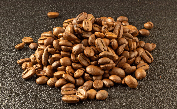 image of coffee beans on a black background close-up