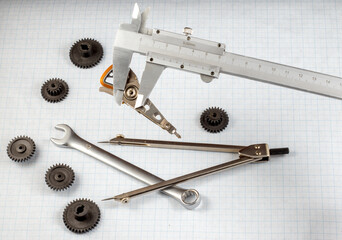 image of a caliper, compass on a white background