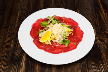 Veal with lime and parmesan cheese.