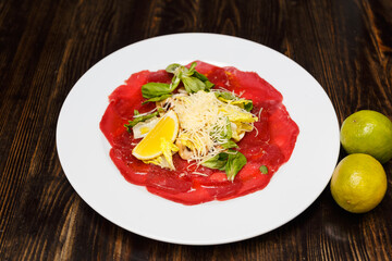 Veal with lime and parmesan cheese.