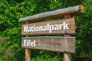 Nationalpark Eifel. Wooden information sign to Eifel National Park in North Rhine-Westphalia, Germany - obrazy, fototapety, plakaty