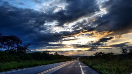 sunset over the road