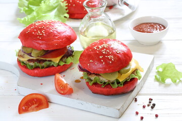 Burgers with red bun and cutlet