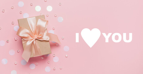 Gifts on pink background, love and valentine concept with text I love you