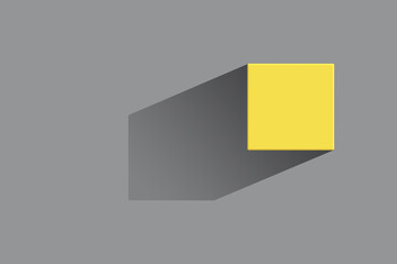 Yellow cube with a sharp shadow on a gray background. Colored in 2021 color trends Ultimate Gray and Illuminating. Minimalist style.
