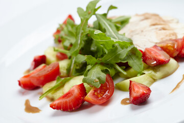 chicken fillet with salad and strawberries