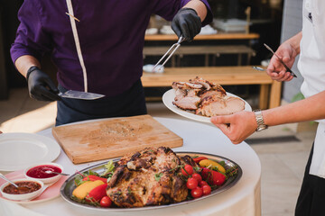 Catering banquet table at wedding reception. Restaurant presentation, european cuisine, food consumption, party concept. Food styling, appetizers bar, welcome drink, event design.