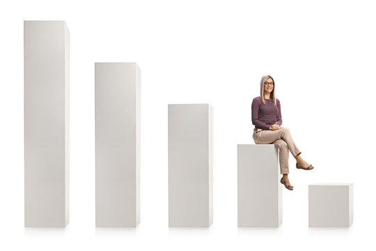 Young blond woman with glasses sitting on a white chart