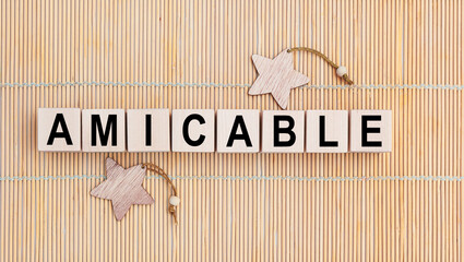 Wooden cubes with the abbreviation Amicable