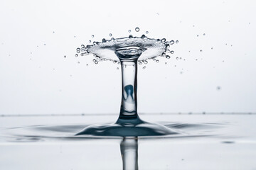 Obraz na płótnie Canvas Freeze water liquid drop splash on pure background