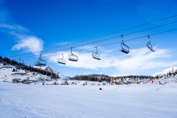 Auron, FRANCE - 30.12.2020: Empty ski slopes and ski lifts in ski resort. During the winter...