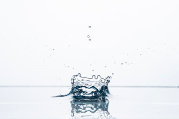 Freeze water liquid drop splash on pure background