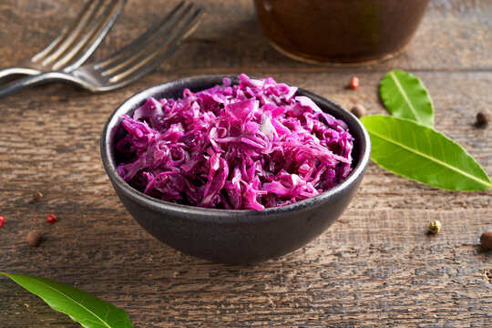 Fermented red cabbage in a bowl on a table
