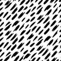 Abstract hand drawn vector seamless pattern. Simple background of ink smears. Black monochrome ornament isolated on transparent. Universal design for print, wrapping, fabric, textile, wallpaper, card.