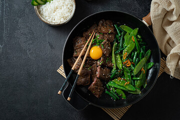Homemade Barbecue Korean Beef Bulgogi, grilled beef steak with spicy sauce, copy space